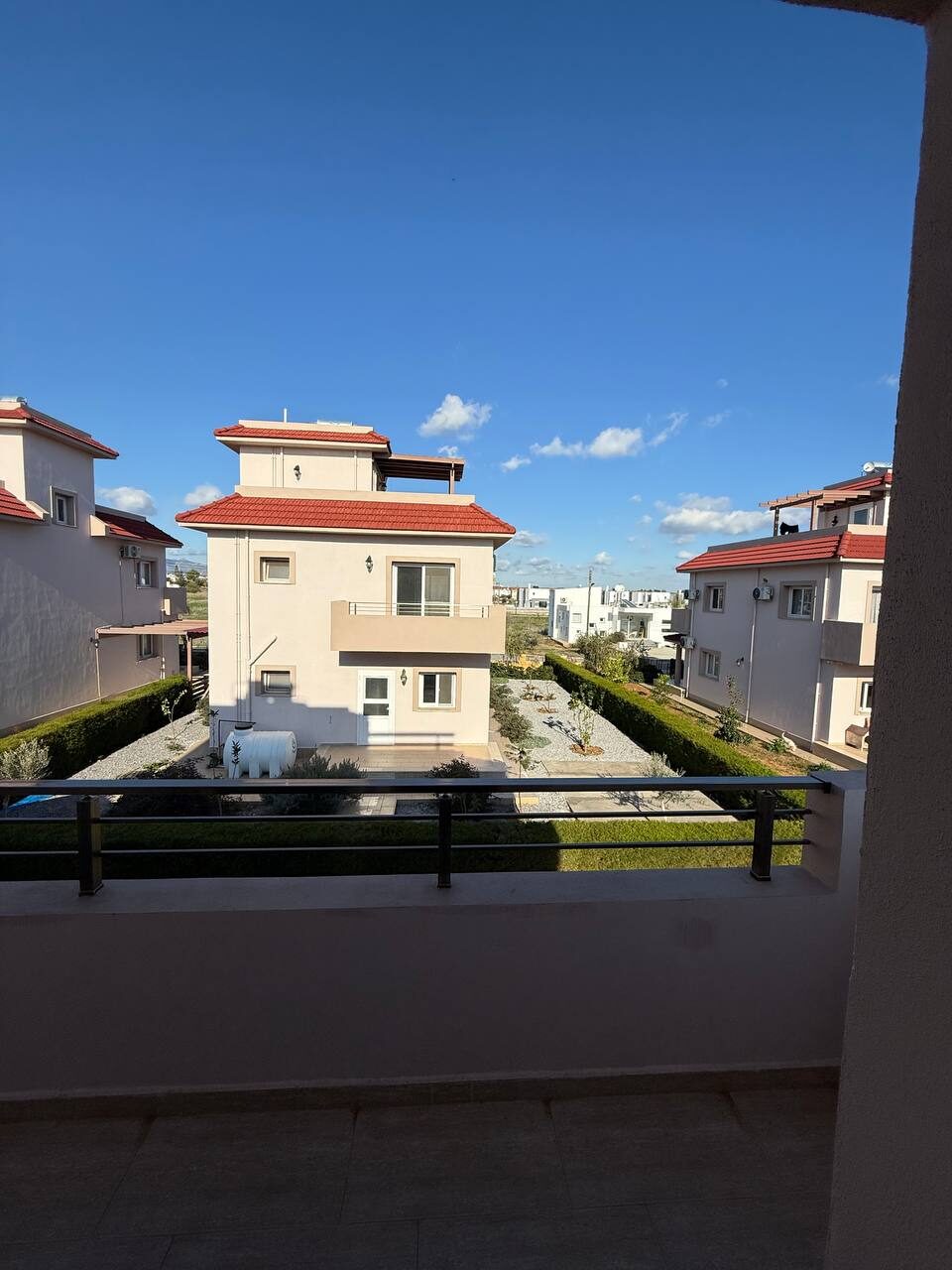 Roof terrace railing, looking over the complex